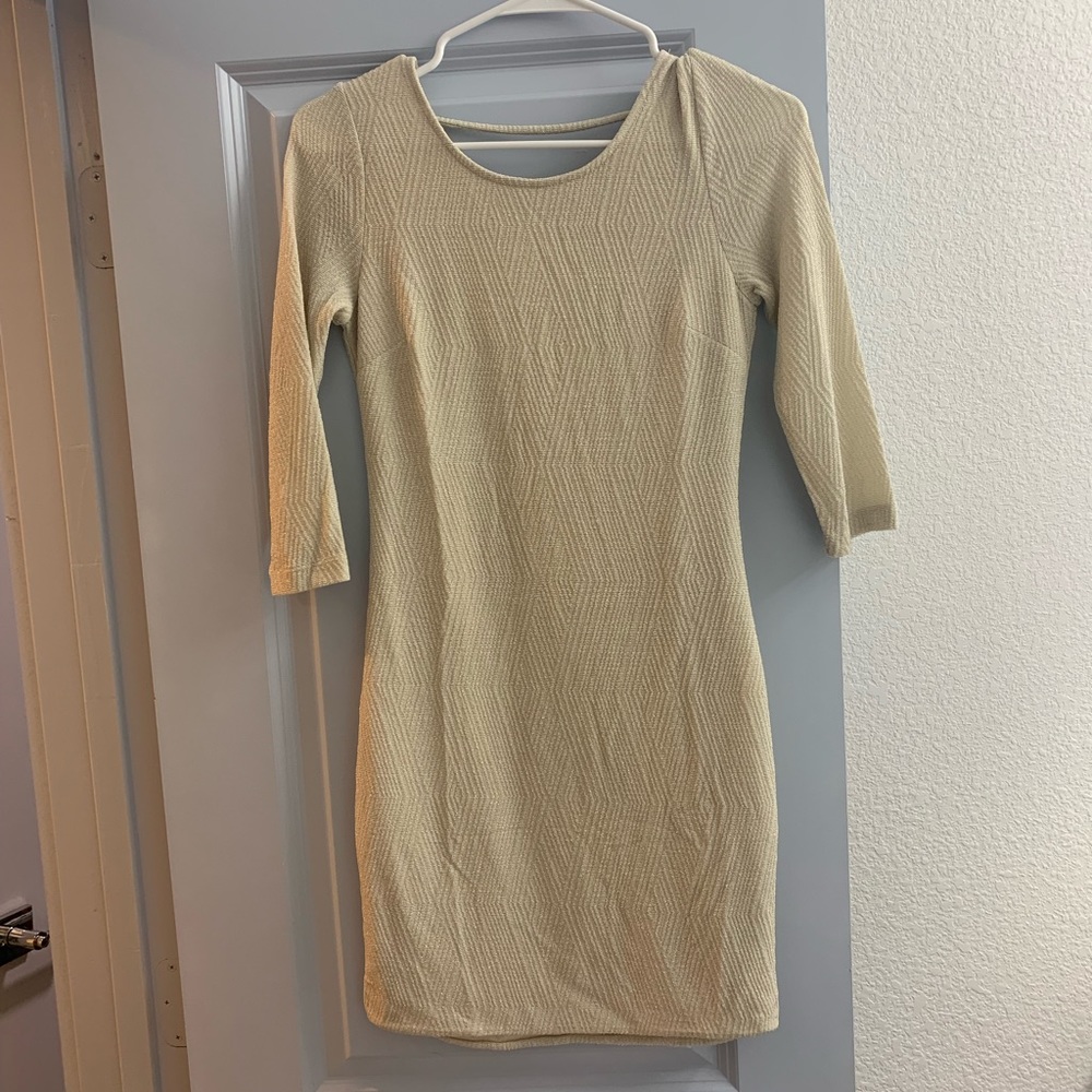 Light tan fitted sparkly dress. Quarter sleeved dress. Only wore twice.
